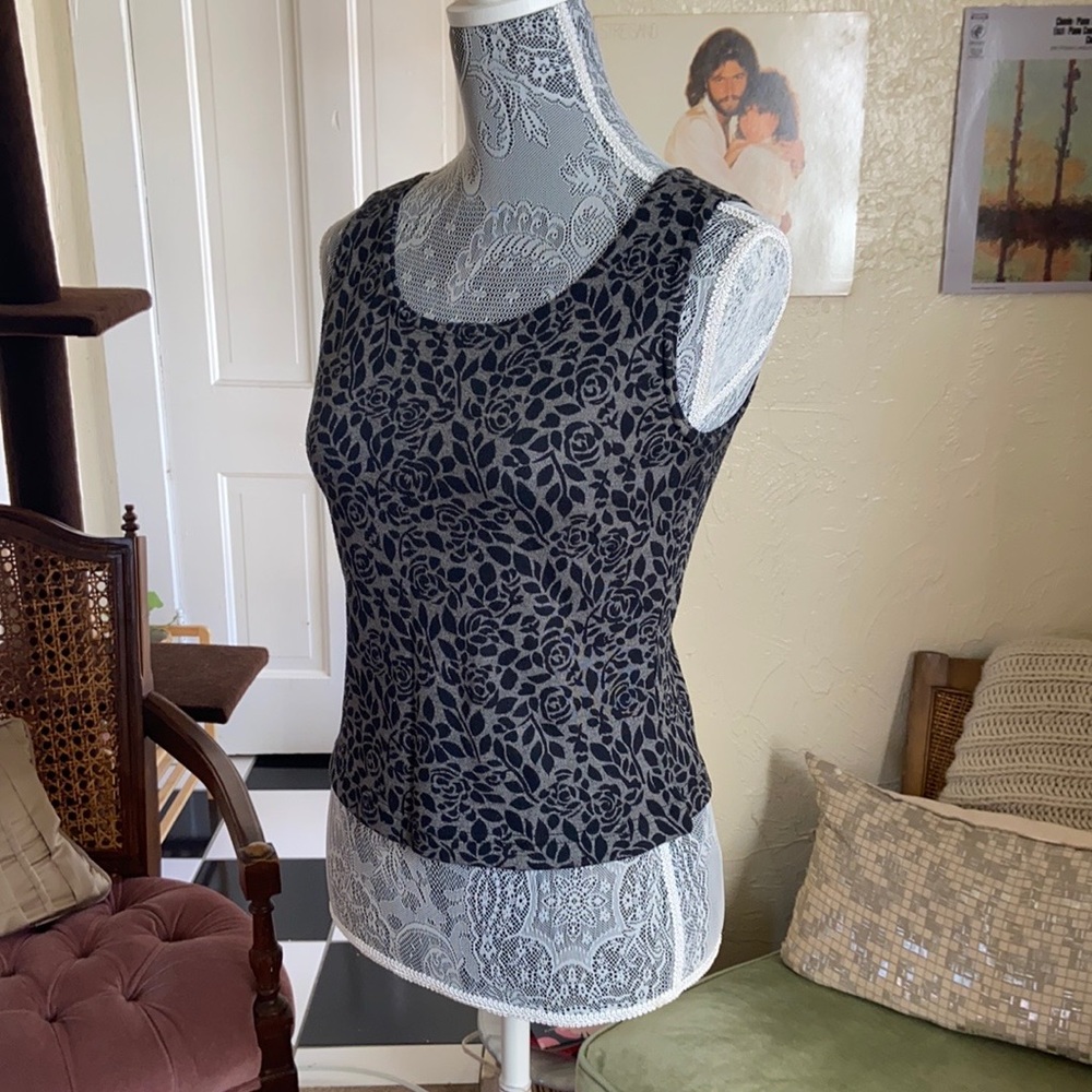 Cropped tank top, shaded floral pattern.